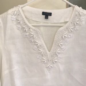 100 percent linen. White long sleeve blouse.